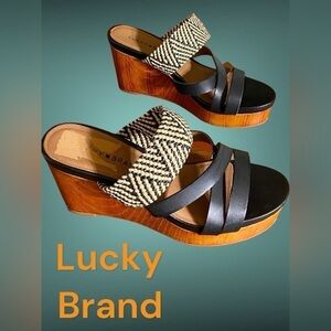 Lucky Brand black woven wood wedges size 7. Three inch heel. Super cute! EUC!